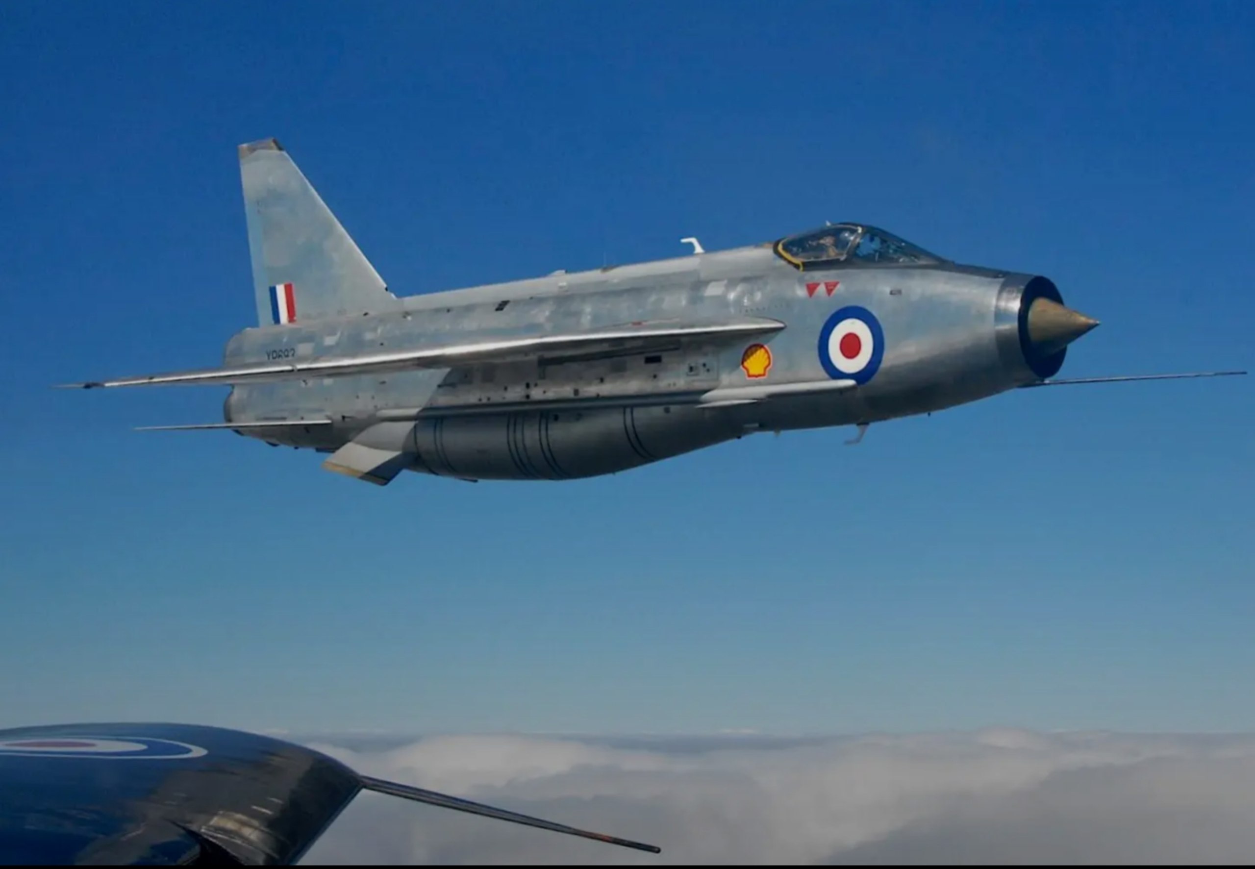 Bare-metal English Electric Lightning air-to-air, photographed by Ian Black